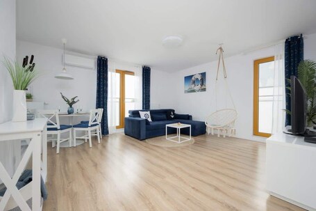 TV. Charming Apartment near Warsaw | Parking, Air Conditioning