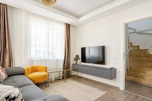 Premium Apartment, Multiple Beds, City View | Living area
