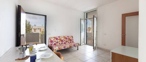 Appartement, balcon, vue ville | Coin séjour