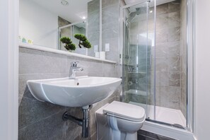 Apartment, 2 Bedrooms, Balcony, River View | Bathroom | Rainfall showerhead, free toiletries, hair dryer, towels