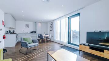 Penthouse, 2 Bedrooms, Balcony, River View | Living area | 40-inch Smart TV with satellite channels, Netflix, streaming services