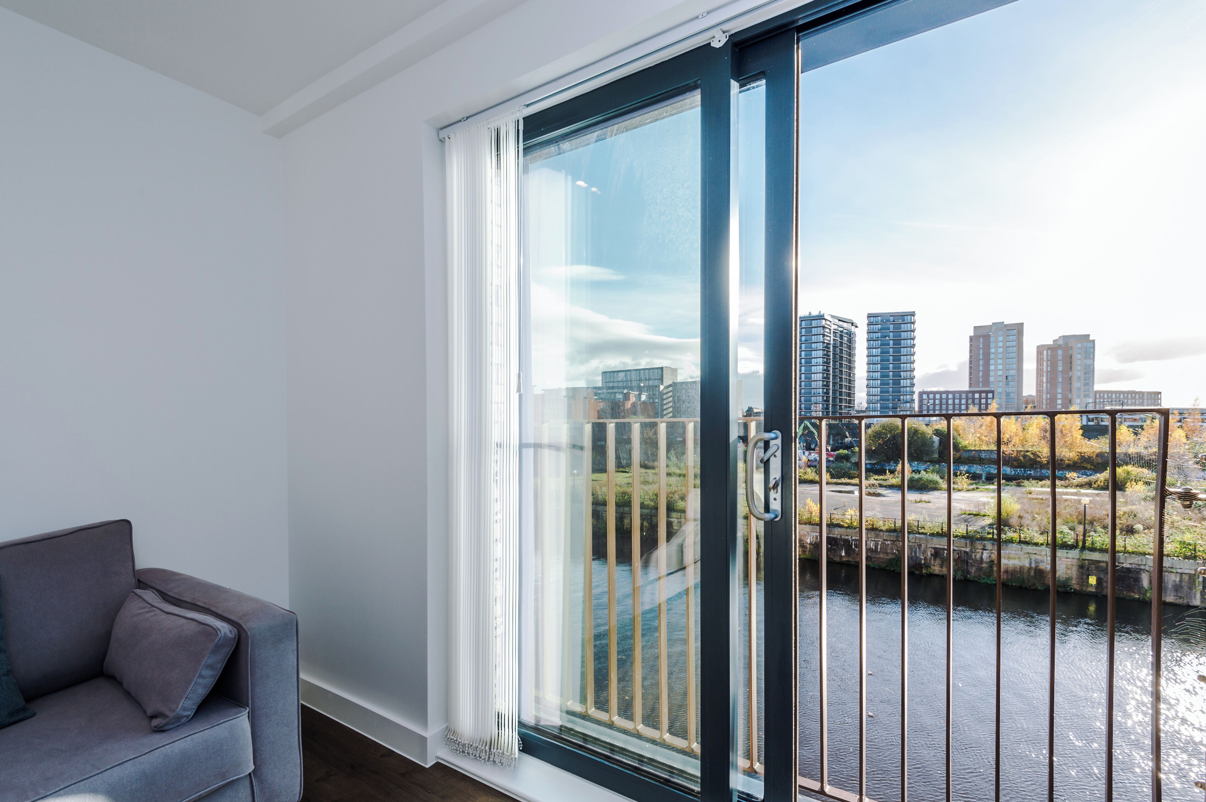 Apartment, 2 Bedrooms, Balcony, River View | Living area | 40-inch Smart TV with satellite channels, Netflix, streaming services