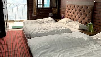 Deluxe Quadruple Room | Free WiFi, bed sheets