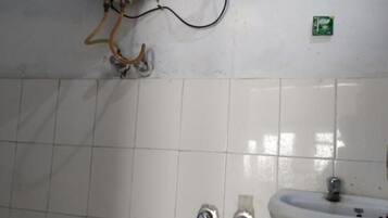 Deluxe Triple Room, City View | Bathroom | Shower, rainfall showerhead, towels, soap