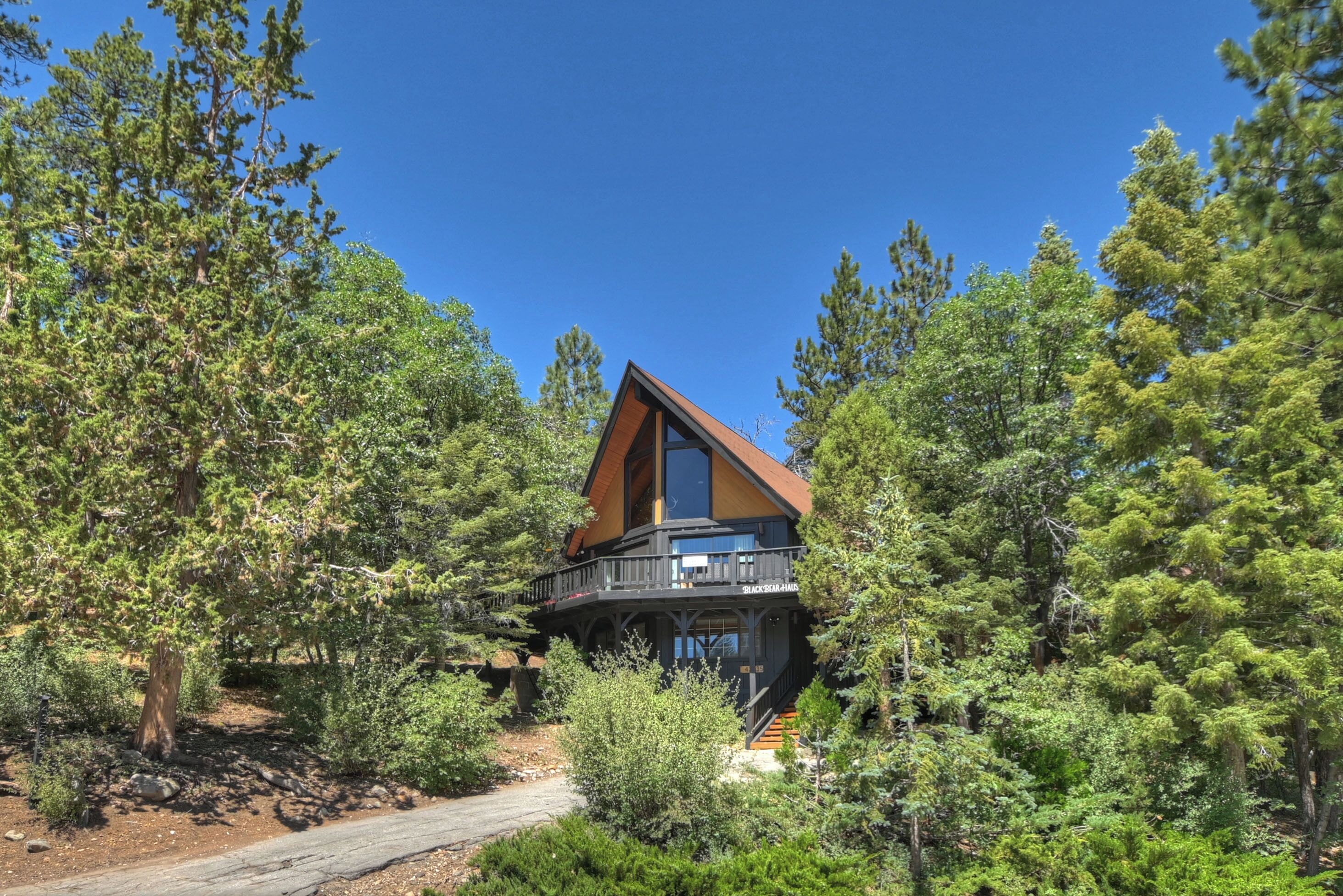 Picturesque home, Game room, Multiple Fireplaces, Firepit, Wrap around lounging