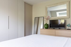 Apartamento (1 Bedroom) | 1 quarto, ferros/tábuas de passar roupa, roupa de cama