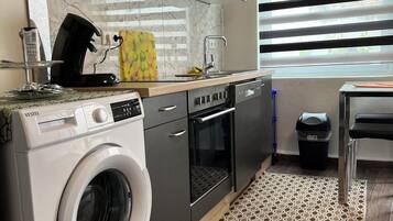 Apartamento estándar, patio | Cocina privada