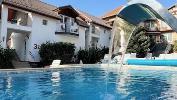 Indoor pool, seasonal outdoor pool, pool umbrellas