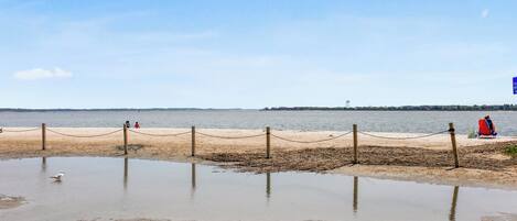 On the beach, sun-loungers, beach towels