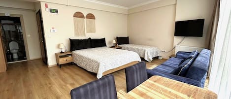 Egyptian cotton sheets, premium bedding, minibar, desk