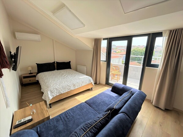 Loft urbano, vista a la ciudad | Sábanas de algodón egipcio, ropa de cama de alta calidad y minibar