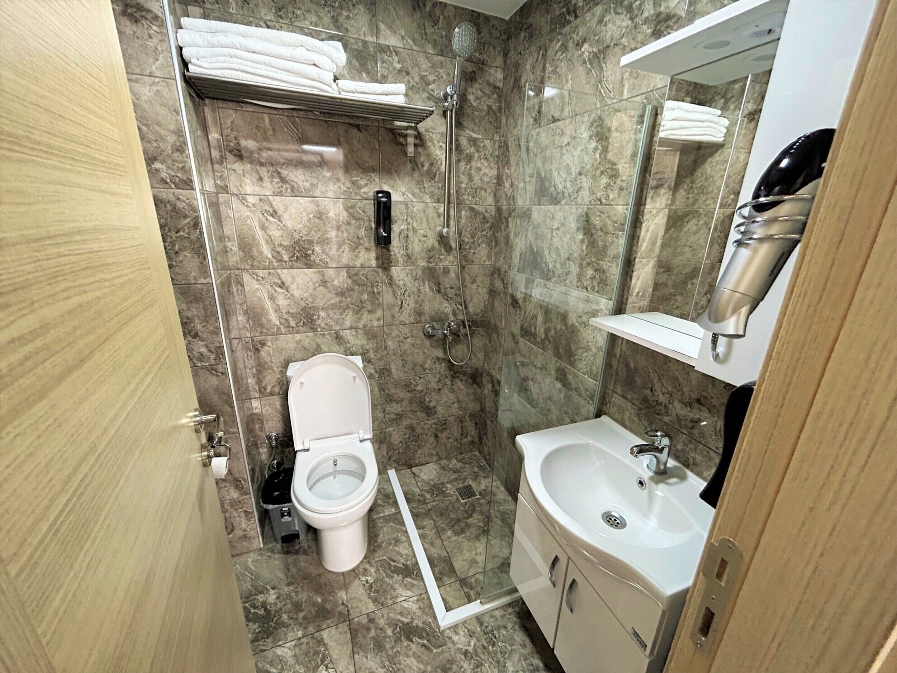 Shower, rainfall showerhead, hair dryer, slippers