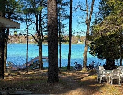 Cottage On Pristine Lakefront With Sunset Views And Sandy Shores