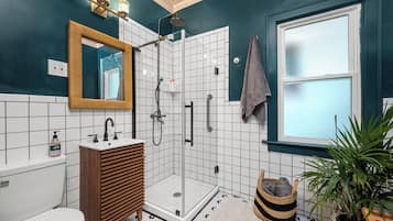 Shower, eco-friendly toiletries, hair dryer, towels