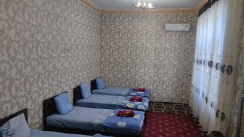 Basic Quadruple Room | Hypo-allergenic bedding, down duvets, desk, laptop workspace