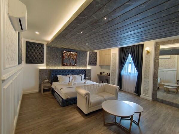 Executive Suite, City View | Premium bedding, down comforters, minibar, in-room safe