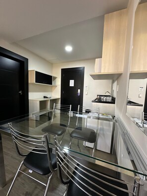 Classic Quadruple Room, Garden View | Private kitchen - Thermas Itaipuland (Itaipulandia)