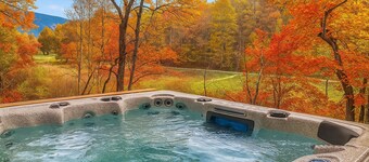 Spacious 4-bedroom river front cabin with WiFi, Game Room & Hot Tub for 15