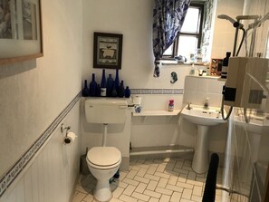 Shower, hair dryer, soap, shampoo