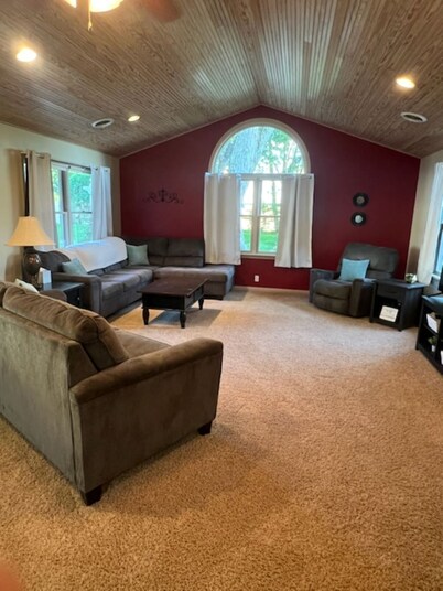 Charming 3-bedroom house in tranquil Greenville with WiFi, AC, and game room. 