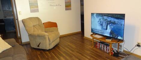 Smart TV, DVD player, table football, books