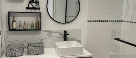 Hair dryer, towels, soap, shampoo