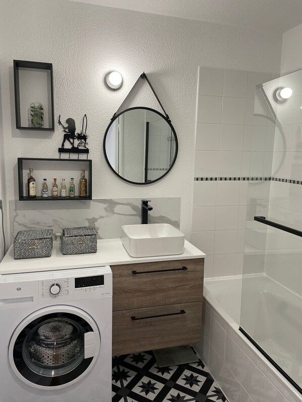 Hair dryer, towels, soap, shampoo