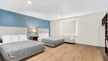 Desk, laptop workspace, free WiFi, bed sheets