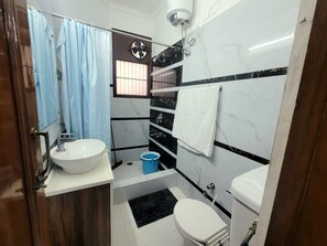 Bidet, towels, soap, shampoo