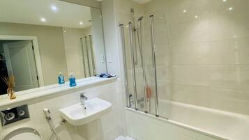 Hair dryer, towels, soap, shampoo