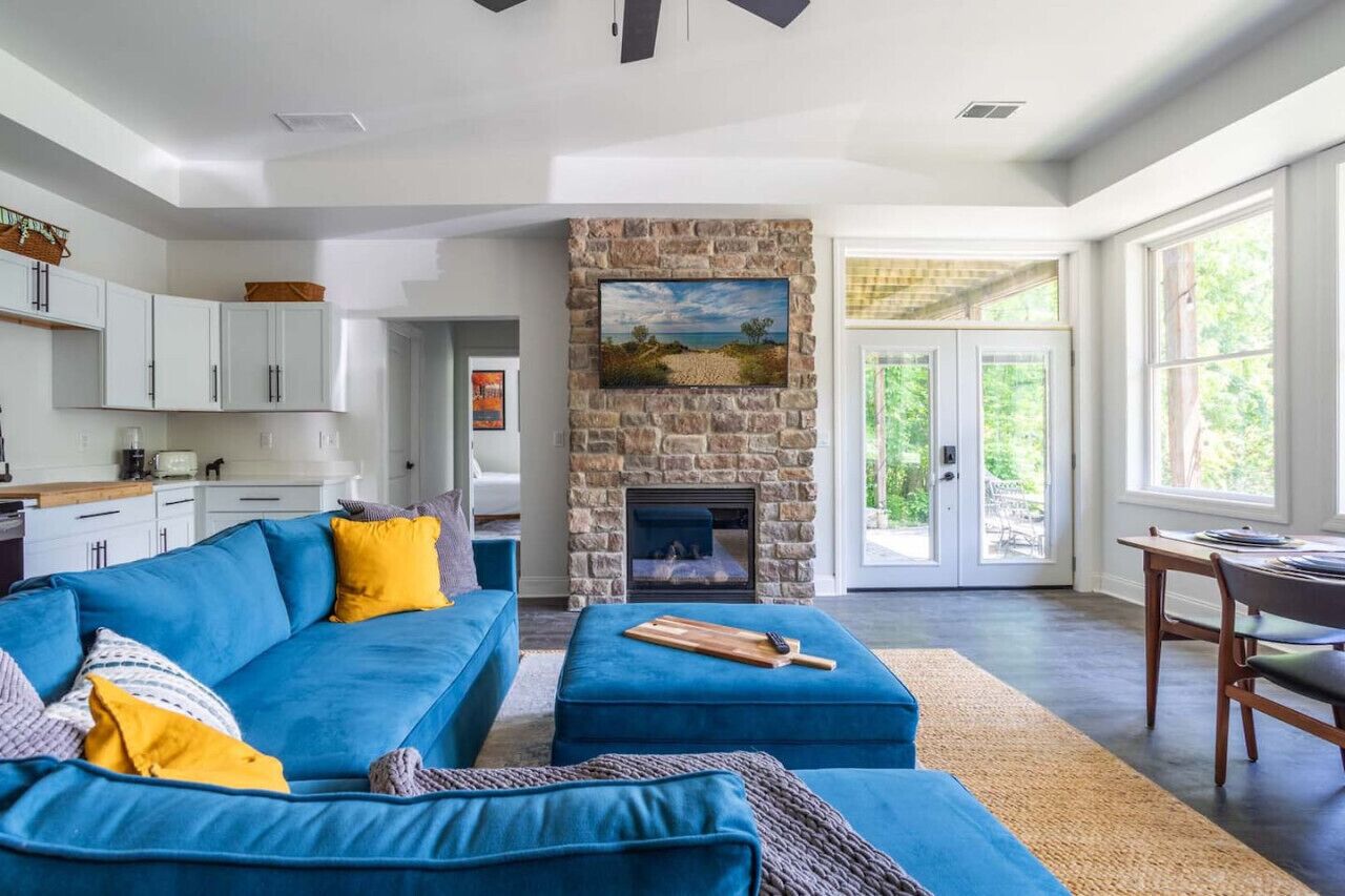 Smart TV, fireplace, books, computer monitors