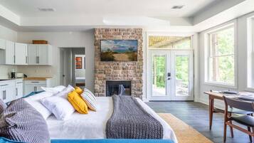 1 bedroom, desk, iron/ironing board, travel crib