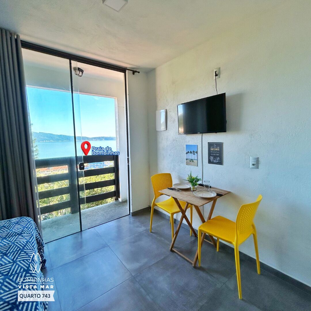 Quarto casal superior, sacada, vista para o mar | Área de estar