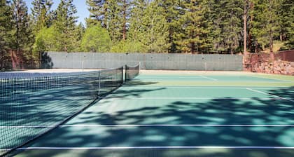 Creekside retreat with pool access, deck, fireplace, and high speed WiFi