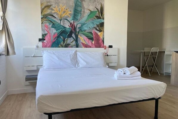 2 quartos, ferros/tábuas de passar roupa, Wi-Fi, roupa de cama