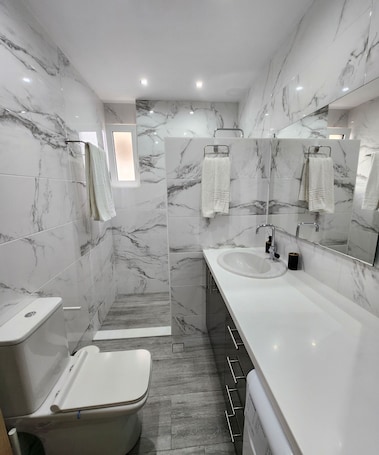 Shower, hair dryer, towels, soap. Loft apartment in Kos
