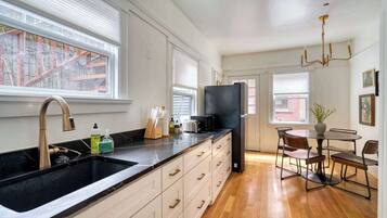 Fridge, coffee/tea maker, cookware/dishes/utensils