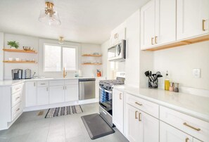Dishwasher, coffee/tea maker, cookware/dishes/utensils