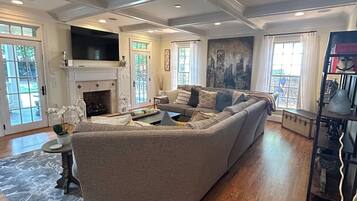 Smart TV, fireplace, books