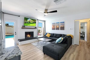 Smart TV, fireplace, books