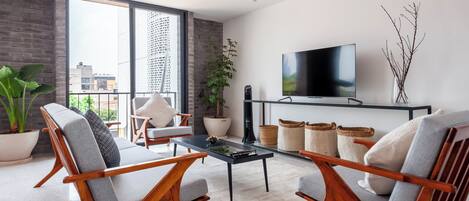 Apartment, 2 Bedrooms, Balcony (8) | Living area | 40-inch Smart TV with cable channels, heated floors