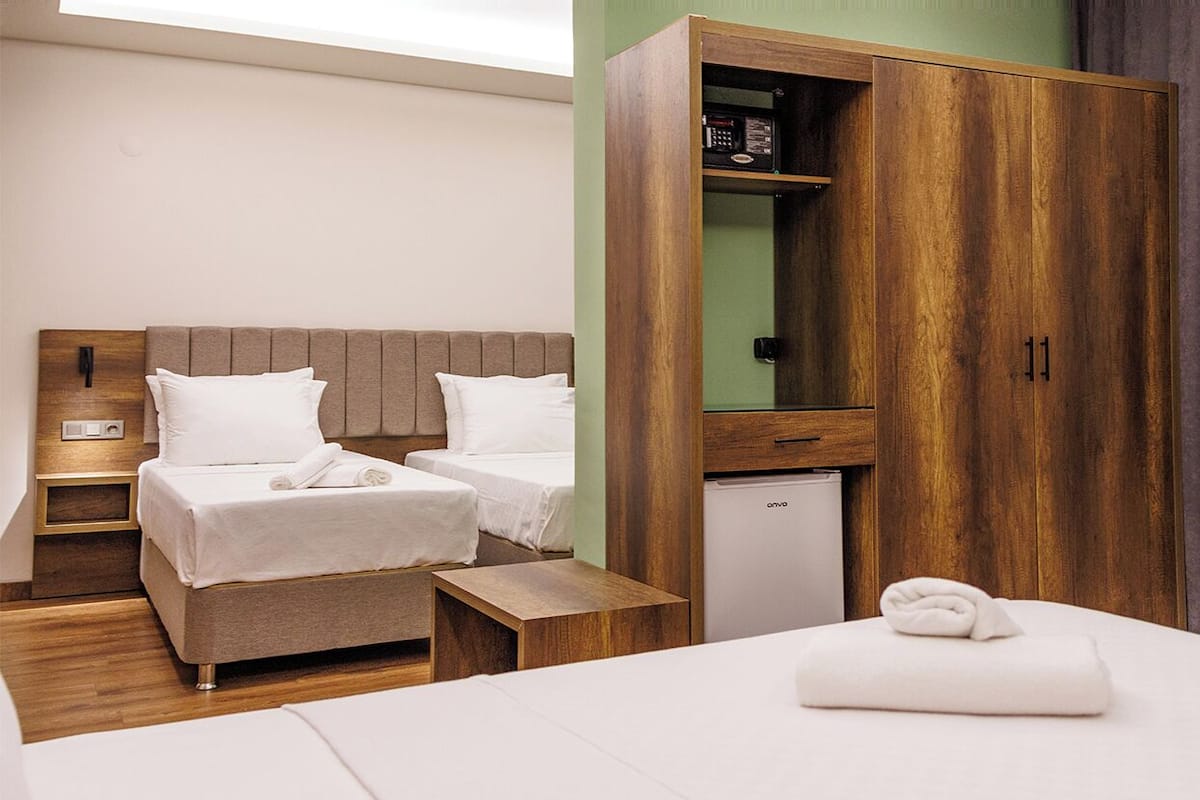 Family Room | 1 bedroom, free minibar items, in-room safe, desk