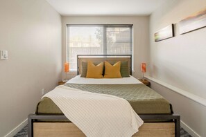 2 dormitorios, tabla de planchar con plancha, cuna de viaje y wifi