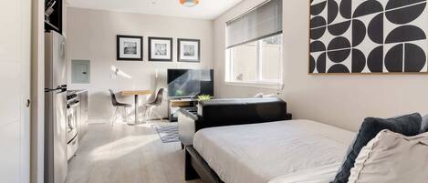 Iron/ironing board, travel crib, WiFi, bed sheets