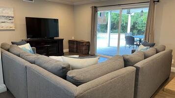House, Multiple Beds, Pool Access, Pool View (Destination #33) | Living area | Fireplace