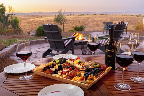 This backyard has it all... al Fresca dining, hot tub, cafe lights, and a gazebo for shade. The views are incredible!