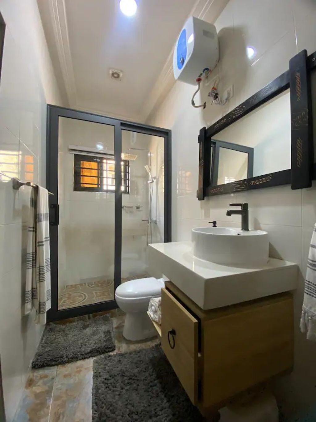 Shower, towels, soap, toilet paper