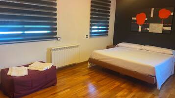 4 slaapkamers, een strijkplank/strijkijzer, wifi, beddengoed