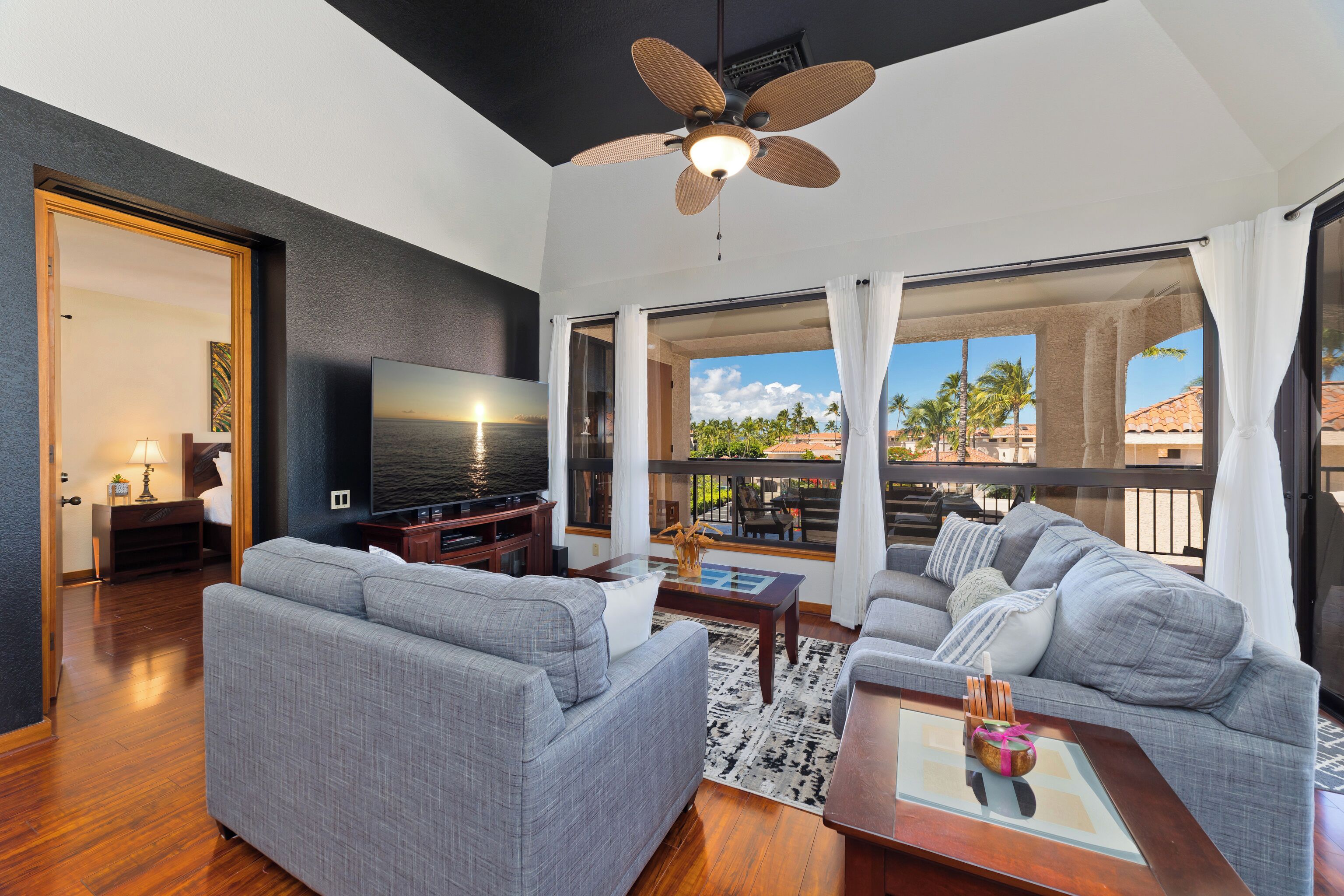 Condo, Garden View | Living room | 65-inch TV with digital channels