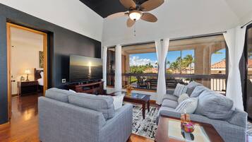 Condo, Garden View | Living room | 65-inch TV with digital channels